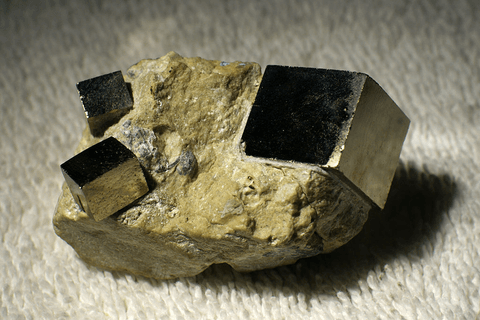 Pyrite crystals grown as natural cubes — a Platonic solid occurring in nature